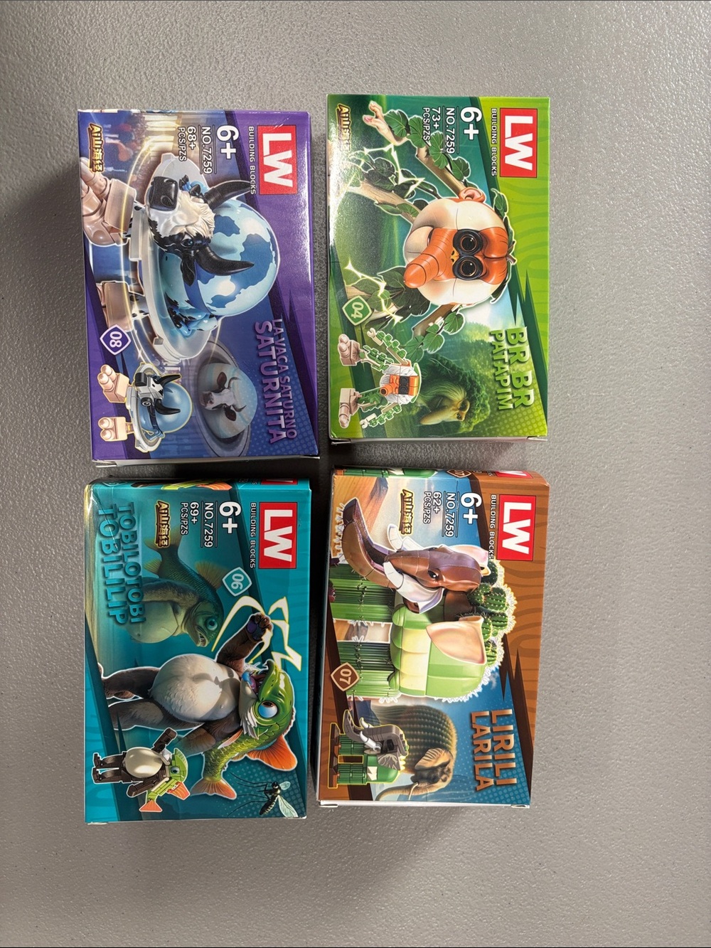 Lego LW Mini Figures Boxed Set - Purple, Green, Blue, Brown